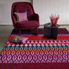 Geometric pattern, colourful rugs, luxury rugs, geometric rug, modern rug, red rug, pink rug, diamond shape rug, tufted rug, pink and red rug 