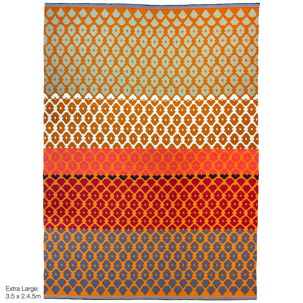 Geometric pattern, colourful rugs, designer rugs, luxury rugs, wool rugs, geometric rug, modern rug, orange rug, red rug, diamond shaped rug 