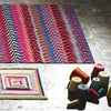 luxury rug, geometric rug, modern rug, wool rug, designer rugs, colourful rug, pink rug, red rug