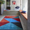 Geometric pattern, colourful rugs, designer rugs, luxury rugs, wool rugs, geometric rug, modern rug, triangle rug, red rug, orange rug